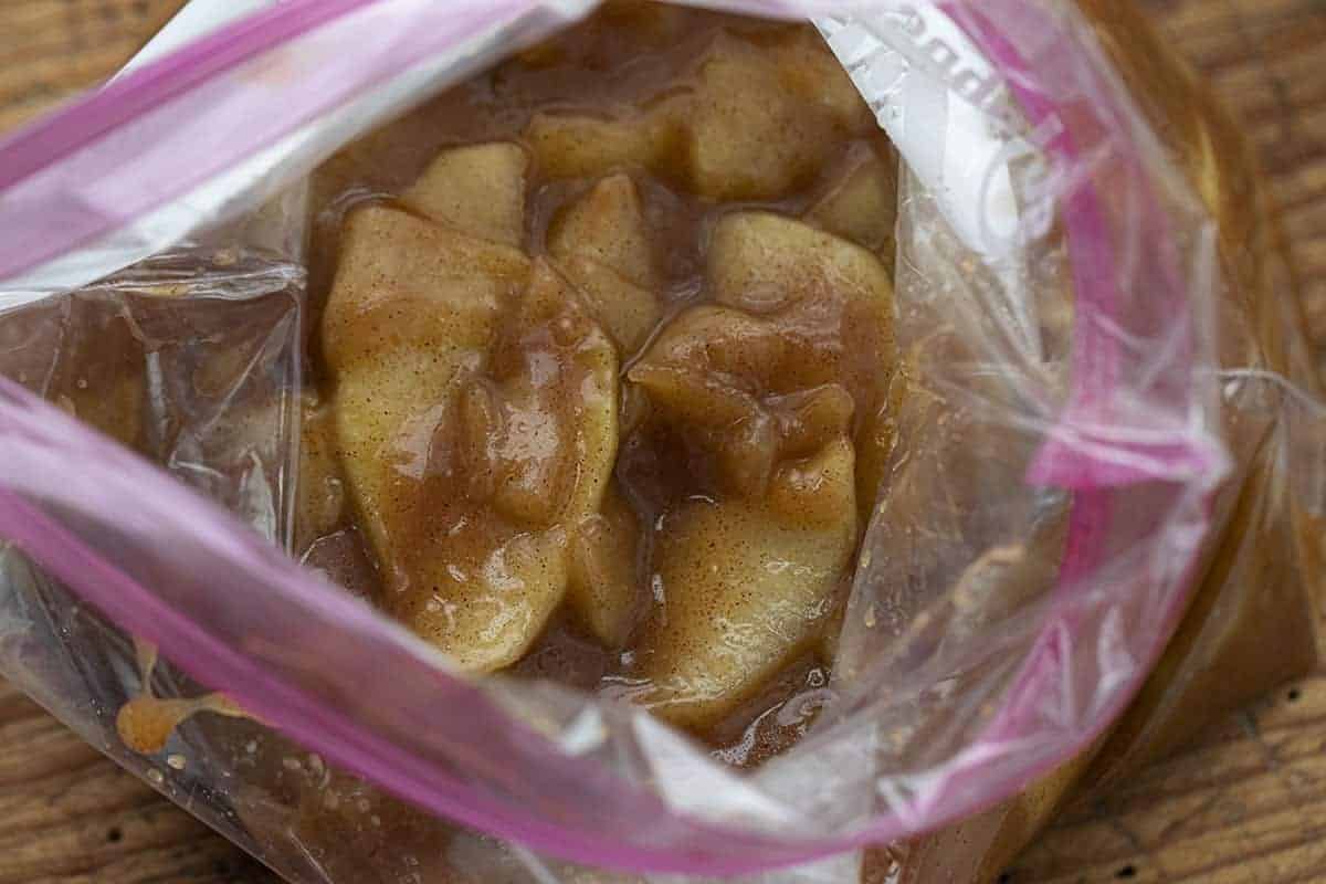 Apple Pie Filling is better than any pie filling you can buy at the store and is perfect for homemade apple pie, desserts, and even as a topping for ice cream! Apple Pie Filling, Pie Filling, How to Make Apple Pie Filling, Easy Apple Pie Filling, Pies, Baking, Cooking, Recipes, Apple Recipes, i am baker, iambaker Apple Pie Filling in a Plastic Bag