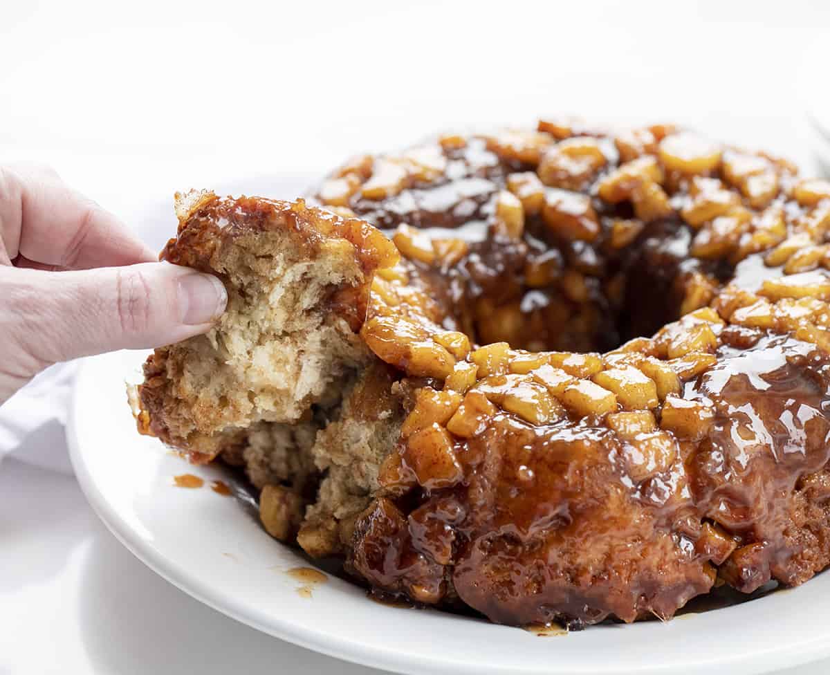 Hand Picking up Piece of Banana Monkey Bread. Breakfast, Monkey Bread, Baking, Breakfast Bread, Morning, Breakfast Recipes, Monkey Bread with Bananas, Bananas Foster Monkey Bread, Bread Bombs, i am baker, iambaker