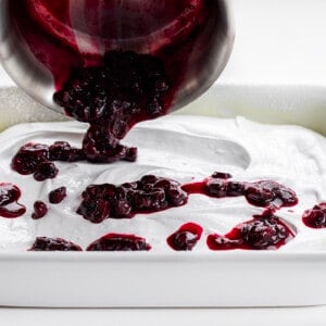 Adding Blueberry Sauce to Gourmet Blueberry Marshmallows.