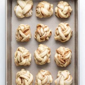 Braided Cinnamon Rolls in a Pan Before Proofing Where They Will Rise More.