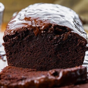 Close up of the inside of Brownie Bread Sitting on a Cutting Board.