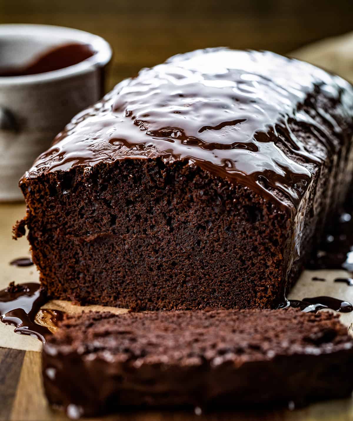 Close up of the inside of Brownie Bread Sitting on a Cutting Board.