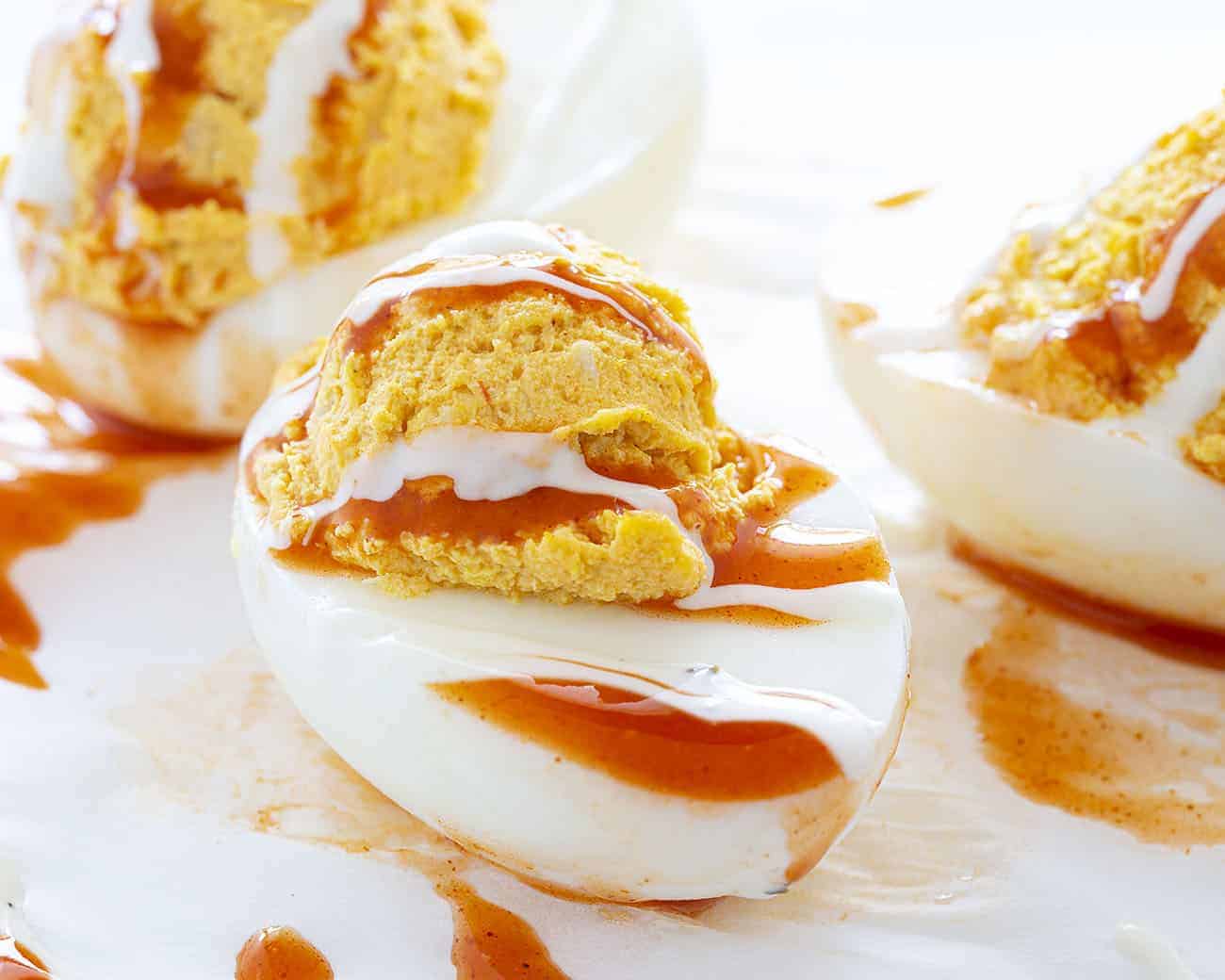 Deviled eggs with a buffalo chicken kick will be your new game day favorite! deviled eggs, buffalo chicken, buffalo chicken deviled eggs, homemade ranch dressing, superbowl appetizer, appetizer, game day appetizer, hard boiled eggs, eggs Buffalo Chicken Deviled Egg