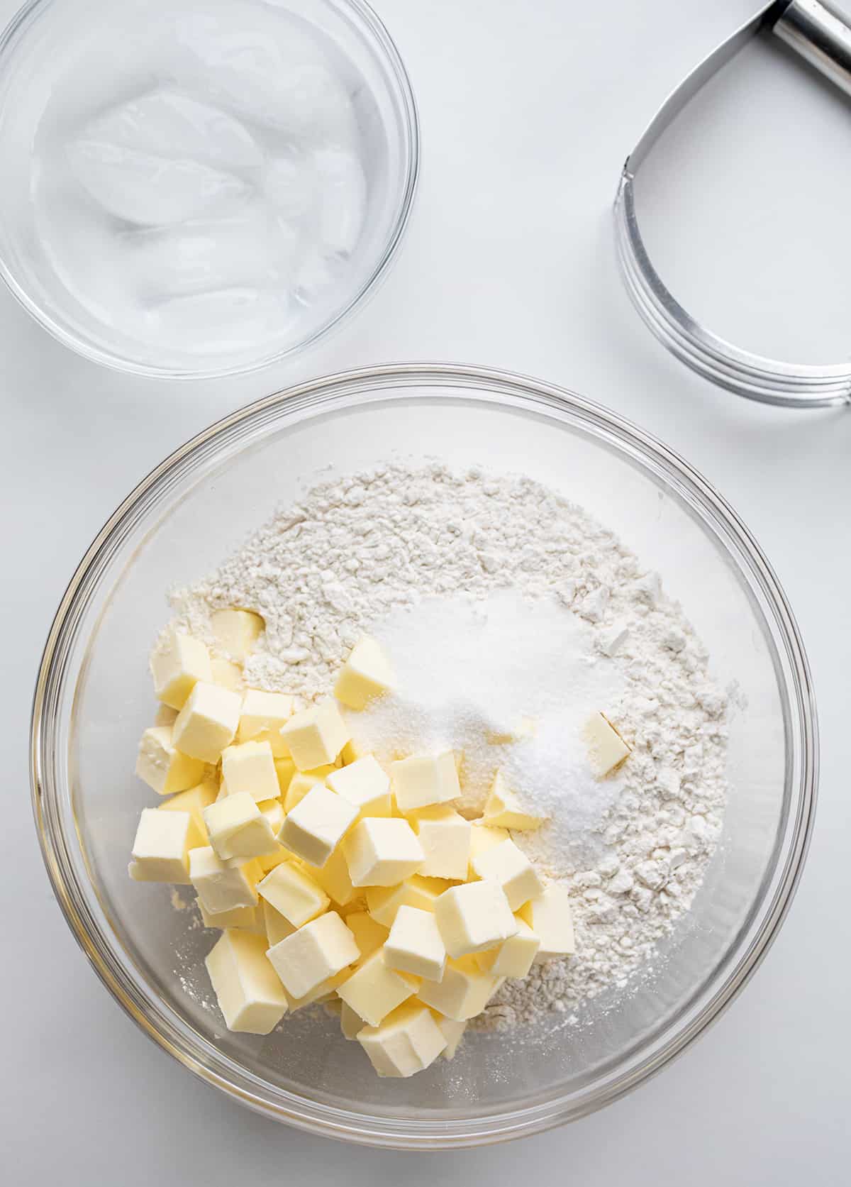 Butter is a versatile ingredient that can be used in many ways, including spreading on bread, baking, and cooking. As a baker, I appreciate the flavor and texture that butter can add to recipes. However, many people have questions about the differences between unsalted and salted butter. I am here to answer those questions! Cubed Butter in a Bowl before Baking.