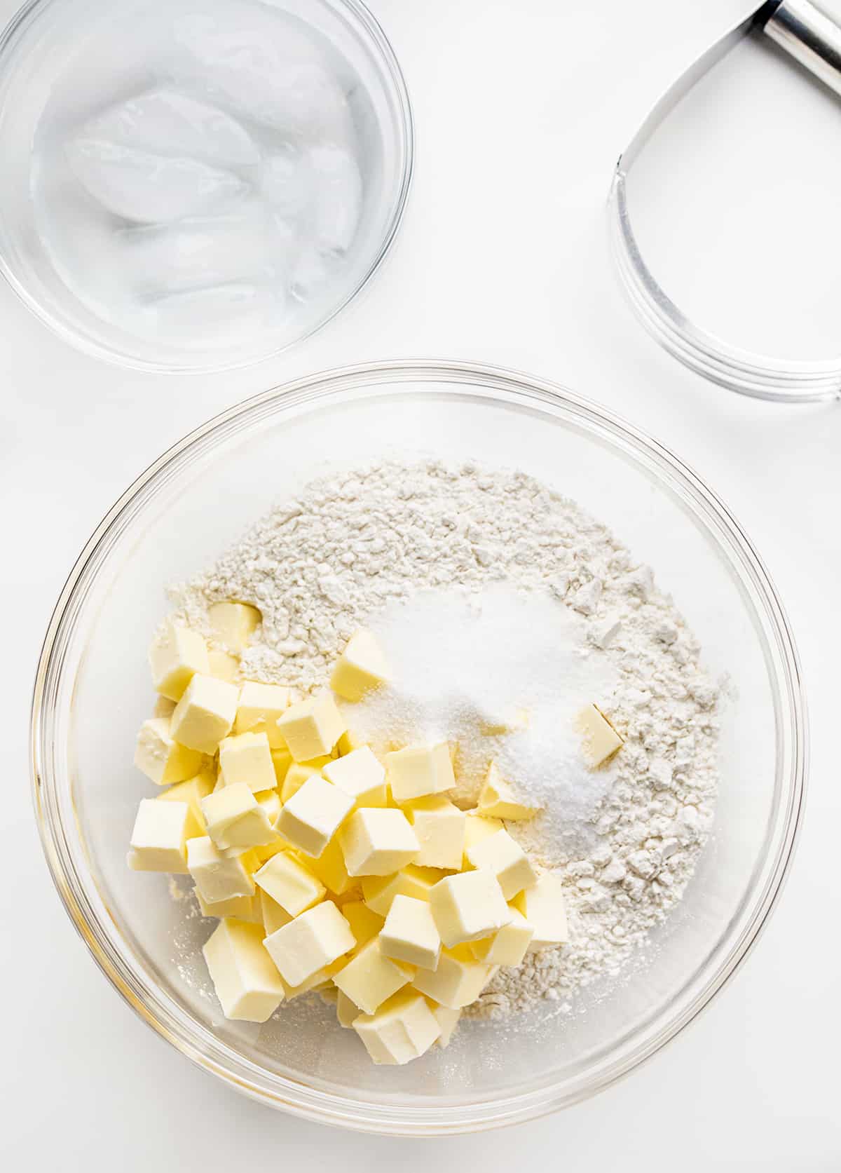 Do you want the best no-fail ALL BUTTER Pie crust? Professional bakers agree, this one tastes the best! Ingredients for All Butter Pie Crust in Bowls.