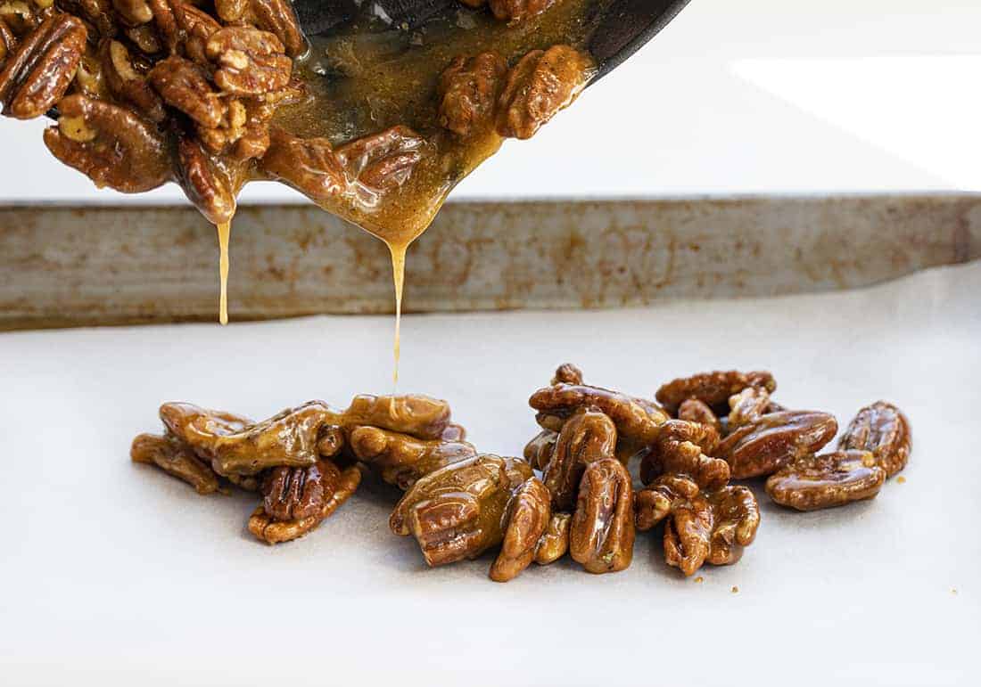 Candied Pecans Poured onto Sheet Pan