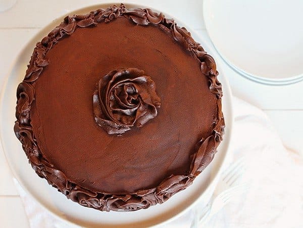 This Perfect chocolate cake has been handed down through generations! Baking, Chocolate Cake, Chocolate Frosting, Cake Decorating, Layer Cake, Dessert, Frosting, i am baker, iambaker, recipes Overhead of Chocolate Cake with Rosette Frosting