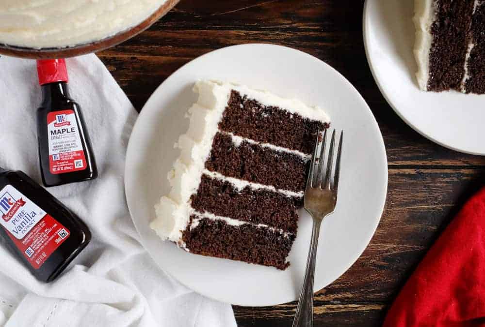 The most flavorful chocolate maple cake you will even try! #chocolatecake #maplecake #chocolatemaplecake #iambaker #baking #cakerecipes The perfect slice of chocolate cake with maple frosting!
