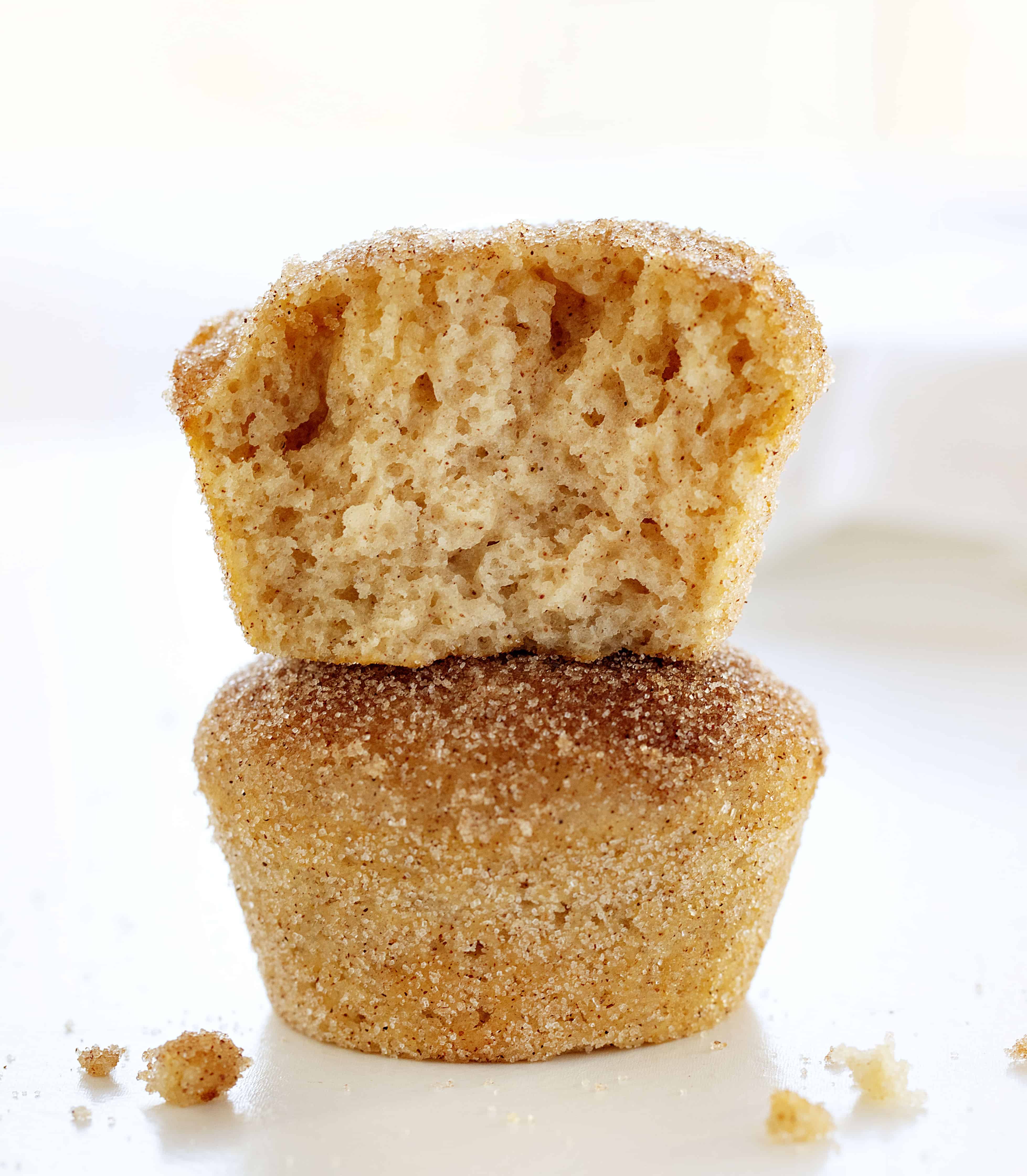 Cinnamon Sugar Donut Muffins are the best of both worlds of donuts and muffins all in one sweet treat! cinnamonsugardonutmuffins donutmuffins cinnamonsugar sugardonuts donuts muffins iambaker baking breakfasttreats muffinsrecipes Cinnamon Sugar Donut Muffins Stacked