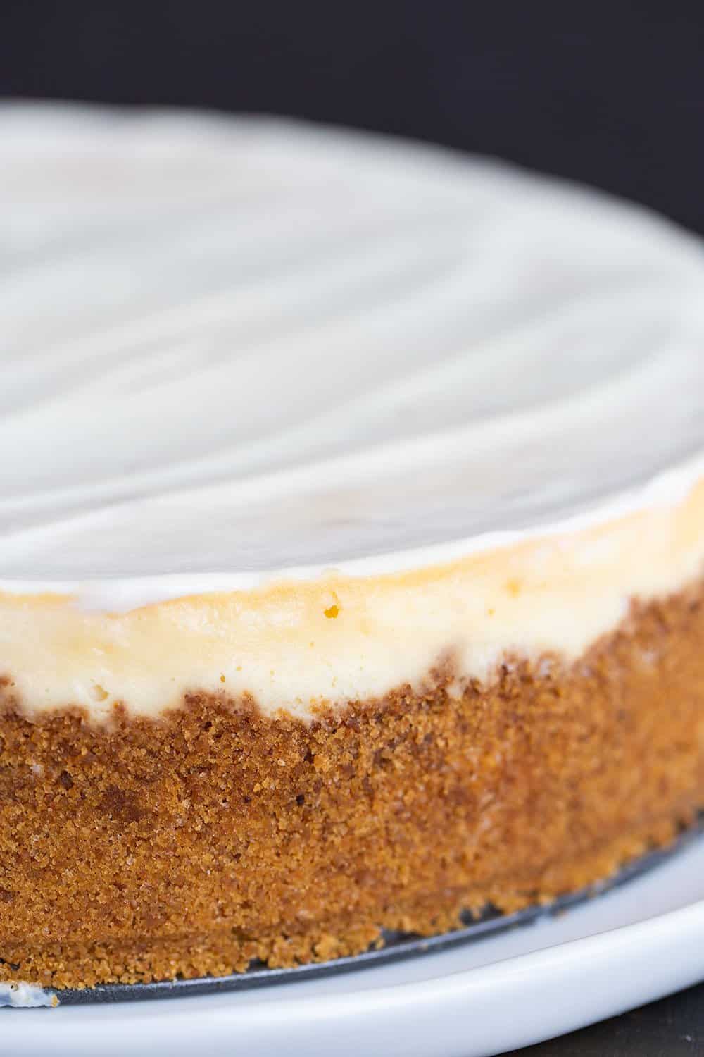 A classic cheesecake recipe that you will use again and again. The topping is what makes it over-the-top special! #cheesecake #cheesecakerecipe #howtobakecheesecake #easycheesecake #classiccheesecake #iambaker Cheesecake with Graham Cracker Crust