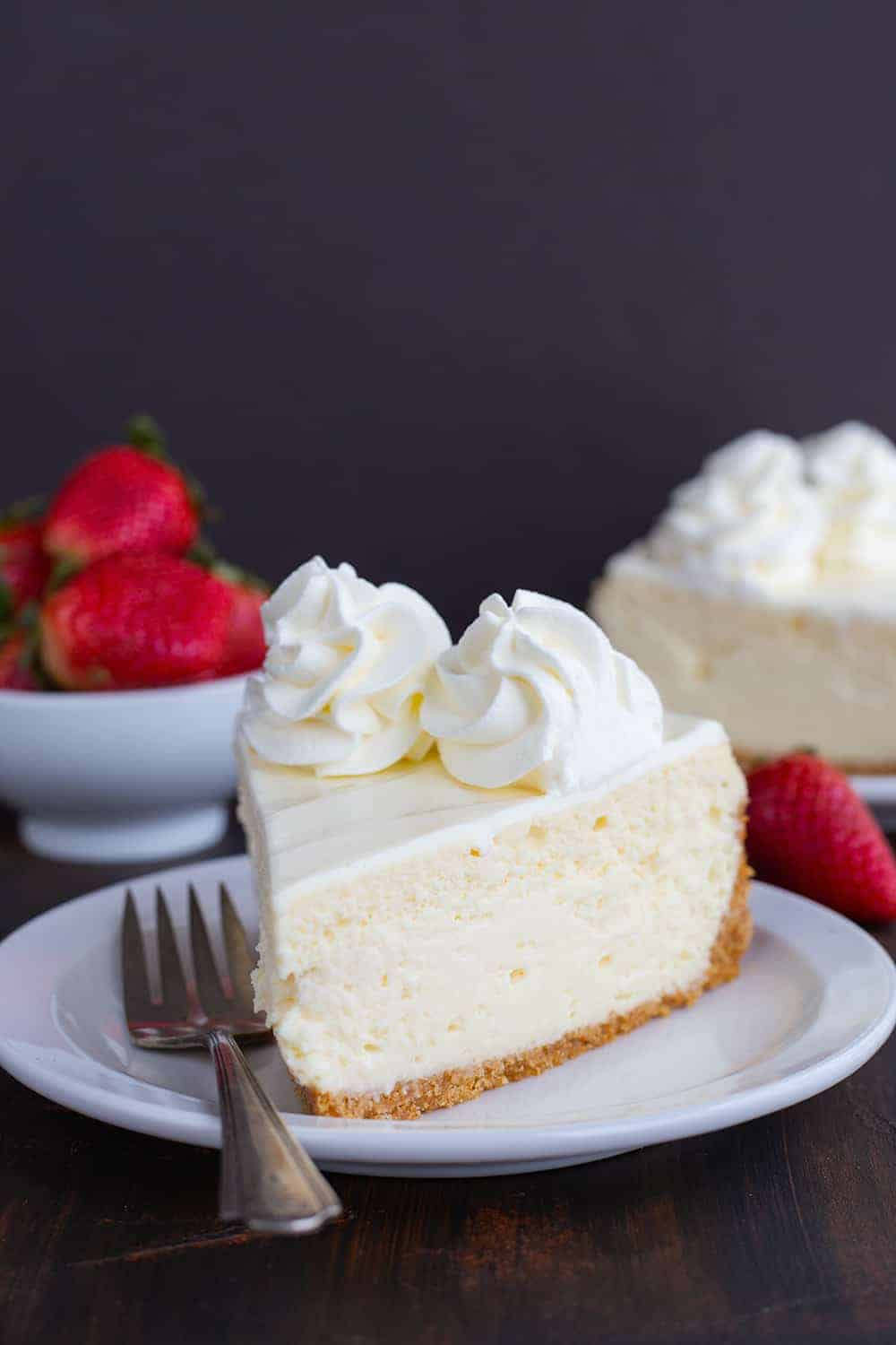 A classic cheesecake recipe that you will use again and again. The topping is what makes it over-the-top special! #cheesecake #cheesecakerecipe #howtobakecheesecake #easycheesecake #classiccheesecake #iambaker Cheesecake Recipe