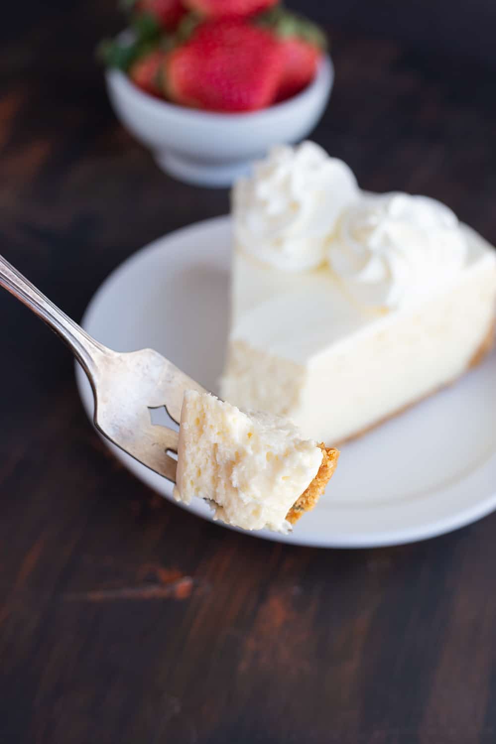 A classic cheesecake recipe that you will use again and again. The topping is what makes it over-the-top special! #cheesecake #cheesecakerecipe #howtobakecheesecake #easycheesecake #classiccheesecake #iambaker Perfect Cheesecake Recipe