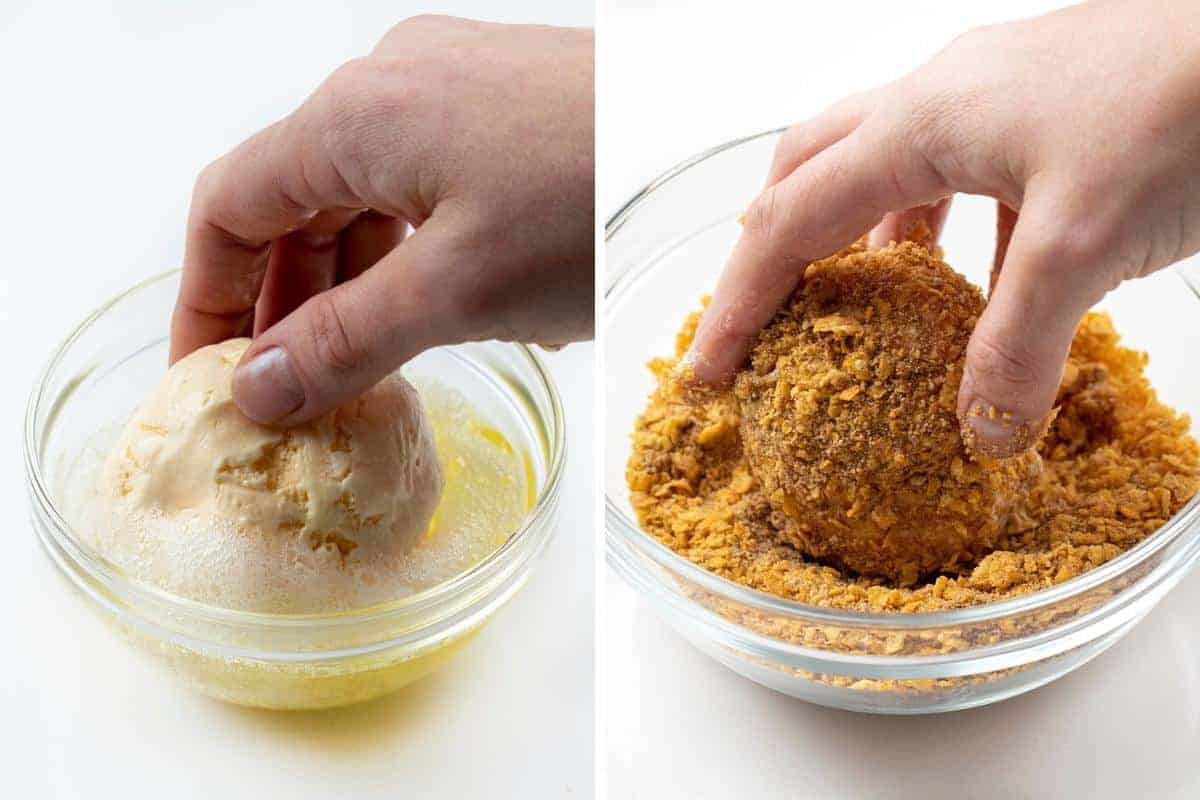 Fried Ice Cream is a frozen ball of ice cream, coated in egg whites, vanilla wafers, cornflakes, and cinnamon, deep-fried to a golden brown. Dessert, No Bake Dessert, Hot Dessert, Ice Cream, Ice Cream Dessert, Summer Desserts, recipes, air fryer fried ice cream, i am baker, iambaker Adding Ice Cream to Egg Wash and then Dipping in Crunch.