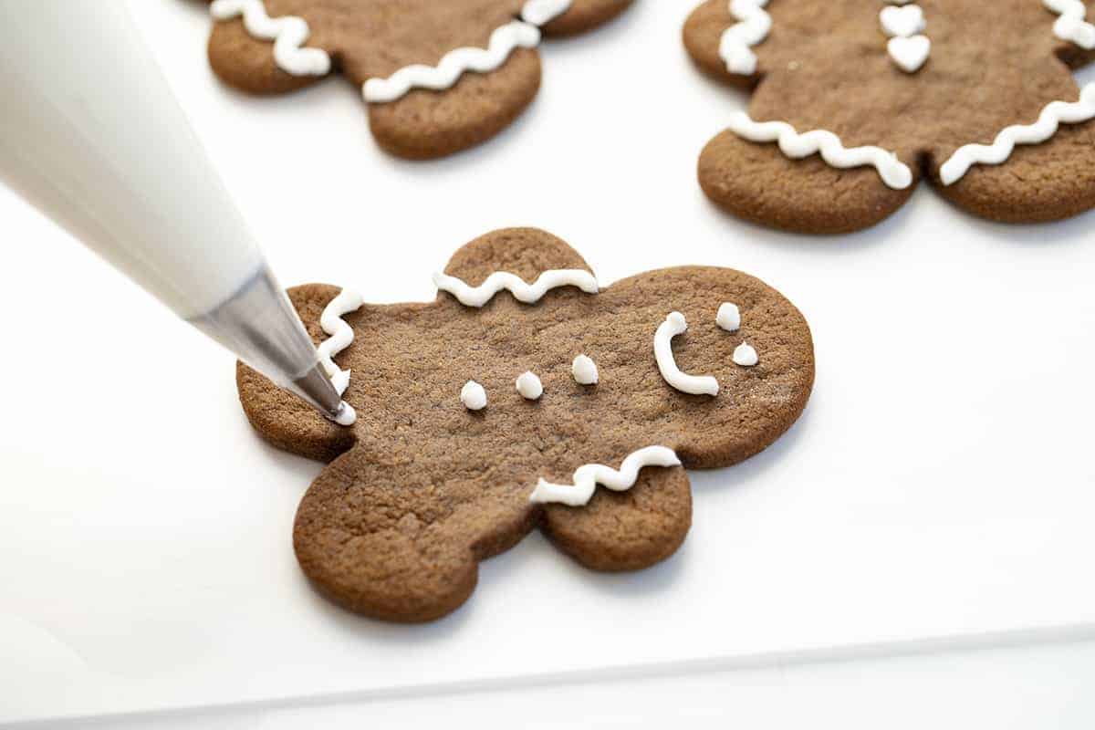 Gingerbread Man Cookie is a cut-out cookie full of ginger, cinnamon, and molasses flavor, decorated as creatively as you like! How to Make Ginger Bread Man Cookies, Gingerbread Cookies, Gingerbread Man Cookies, Baking, Christmas Holidays, Cookies, Recipes, Cookie Recipes, i am baker, iambaker, gingerbread Decorating Gingerbread Man Cookies