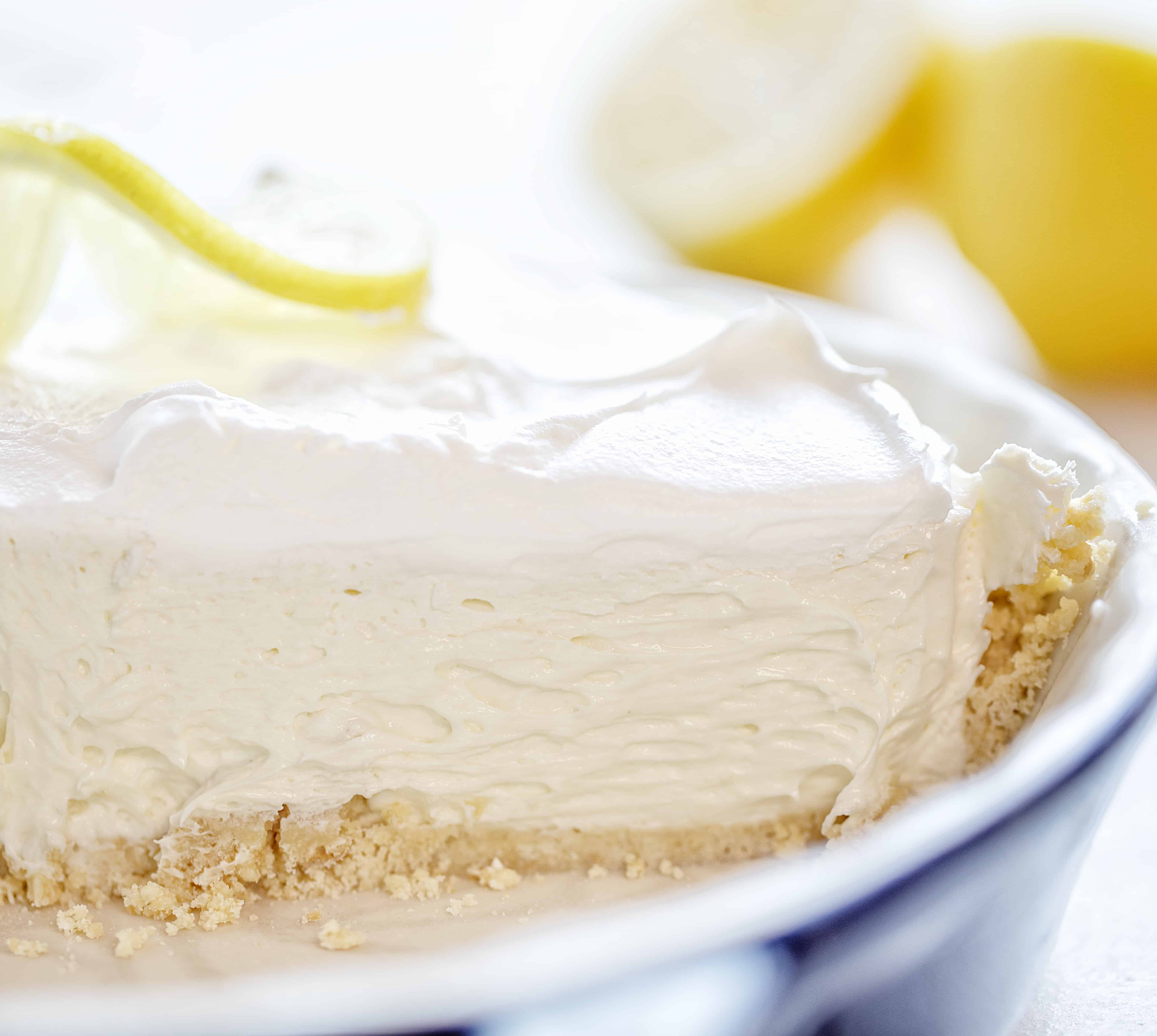 This No Bake Lemon Cream Pie is smooth, velvety, and has the perfect amount of lemon! Super easy to make! #lemoncreampie #lemonpie #nobakedessert #summerdesserts #easydesserts #lemondesserts #iambaker #lemonmousse #nobakepie Creamy Lemon Cheesecake Pie