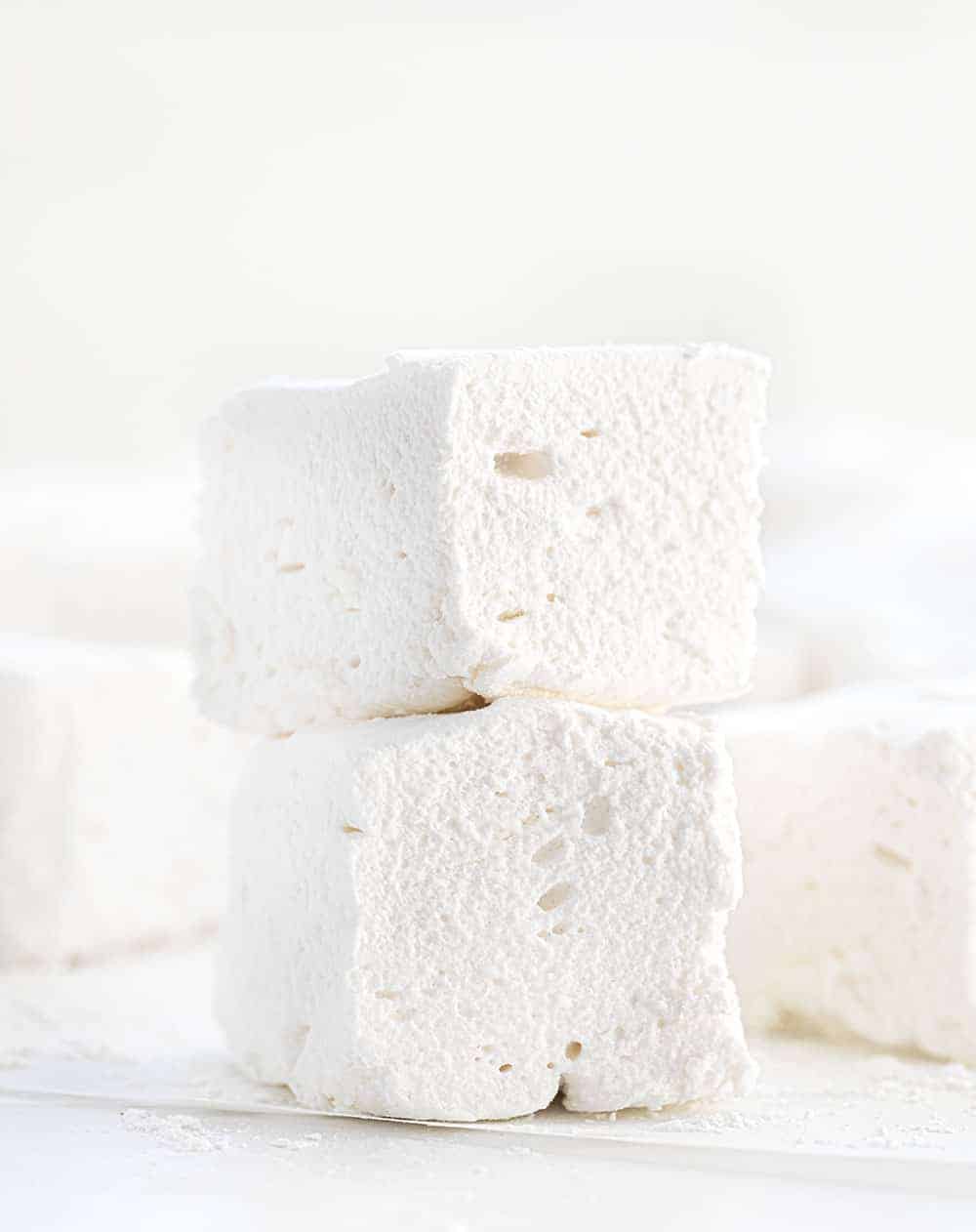 Homemade Marshmallows are better than any you can buy at the store, and they can be made as big or as small, or in any shape, you want! Marshmallows, Homemade Marshmallows, How to Make Marshmallows, Vanilla Marshmallows, i am baker, iambaker, recipes, hot cocoa Homemade Marshmallows