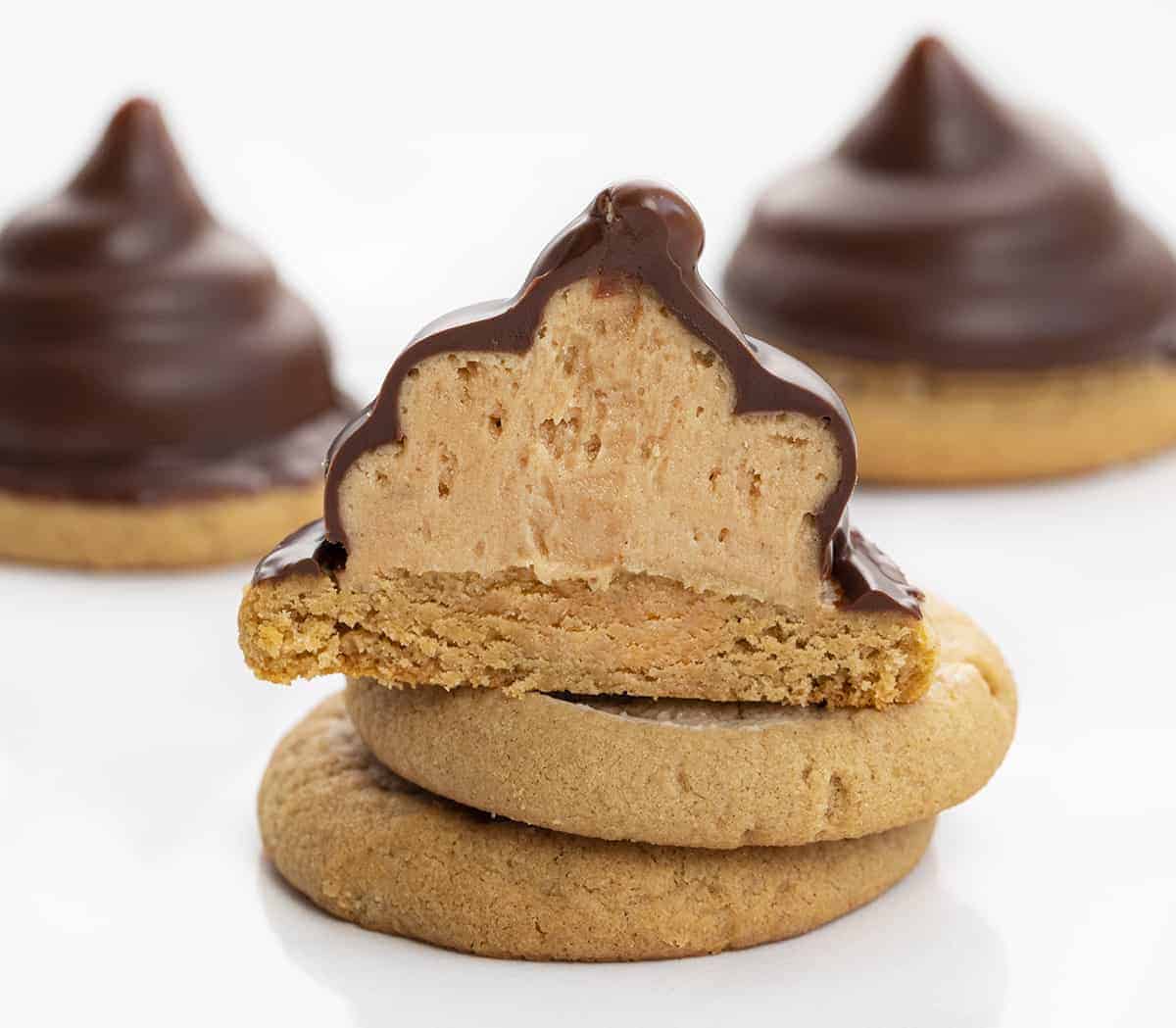 Peanut Butter Hi-Hat Cookies are homemade peanut butter cookies topped with a swirl of peanut butter frosting and dipped in melted chocolate. Hi Hat Cookies, Hi-Hat Cookies, Peanut Butter Cookies, Peanut Butter Hi-Hat Cookies, Dessert, cookies recipes, baking, frosting, peanut butter frosting, i am baker, iambaker Inside of Peanut Butter Hi Hat Cookies