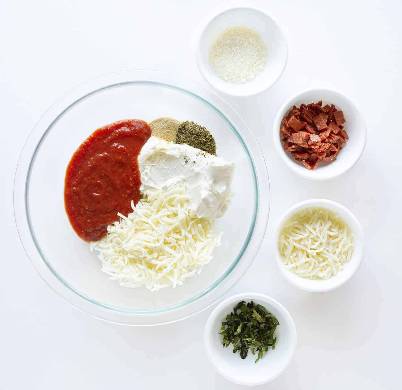 Skillet Pizza Dip combines the deliciousness of garlic bread with a cheesy, pepperoni dip. skillet pizza dip, iambaker, skillet dip, pizza dip, garlic rolls, appetizer, game day appetizer, pizza, dips Ingredients for Skillet Pizza Dip