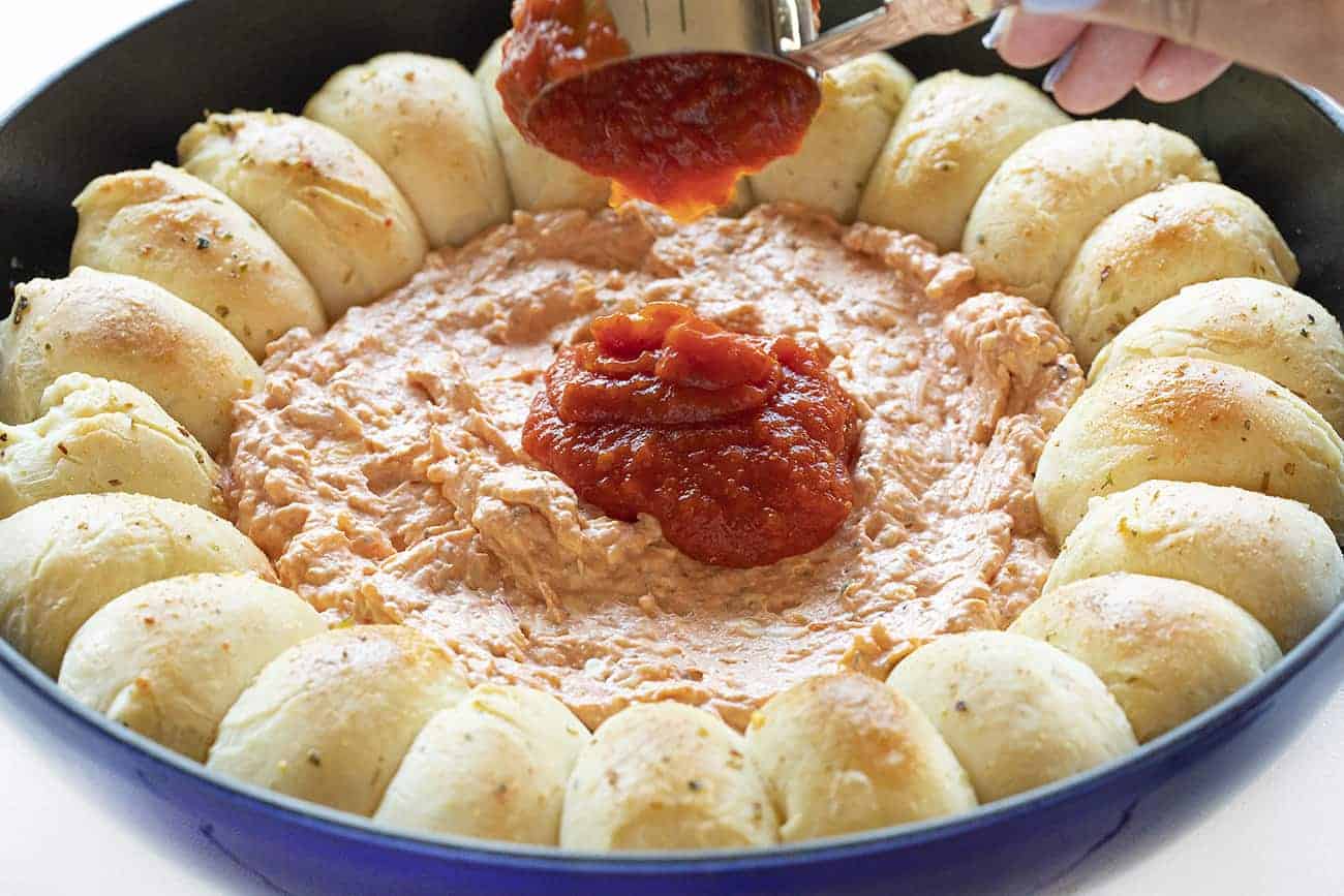 Skillet Pizza Dip combines the deliciousness of garlic bread with a cheesy, pepperoni dip. skillet pizza dip, iambaker, skillet dip, pizza dip, garlic rolls, appetizer, game day appetizer, pizza, dips Preparing Skillet Pizza Dip