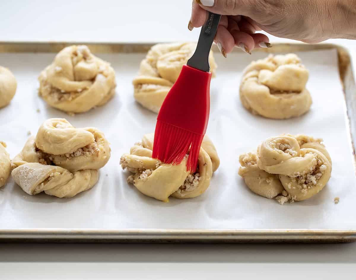 A Ring A Ling Pastry is a delicious and flavorful treat that combines a sweet dough with a nutty filling and tangy orange glaze. It's a copycat recipe from the 1955 Pillsbury Bake-Off winning recipe by Bertha Jorgensen. The spiral design is easy to do and gives you all the flavors of the pastry in every bite!