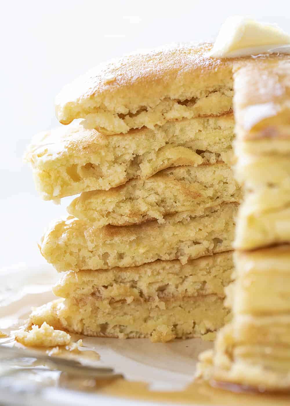 Using your sourdough starter, you can have light and fluffy Sourdough Pancakes ready to serve for a breakfast that will have everyone jumping out of bed! Breakfast, Pancakes, Sourdough Pancakes, How to Make Pancakes with Sourdough Discard, Sourdough Starter, The Best Pancakes, Sourdough Pancakes Recipe, i am baker, iambaker, pancakes Stack of Cut Into Sourdough Pancakes