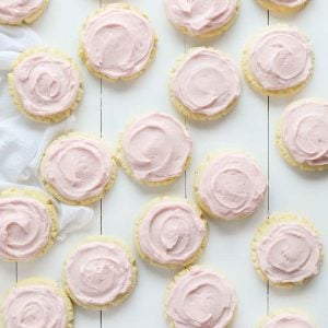 These beautiful cookies are the BEST tasting sugar cookie you will ever try!! Extensively tested and approved! #sugarcookies #sugarcookierecipe #sugarcookiefrosting #swigcookie #pinkfrosting #iambaker Swig Sugar Cookies
