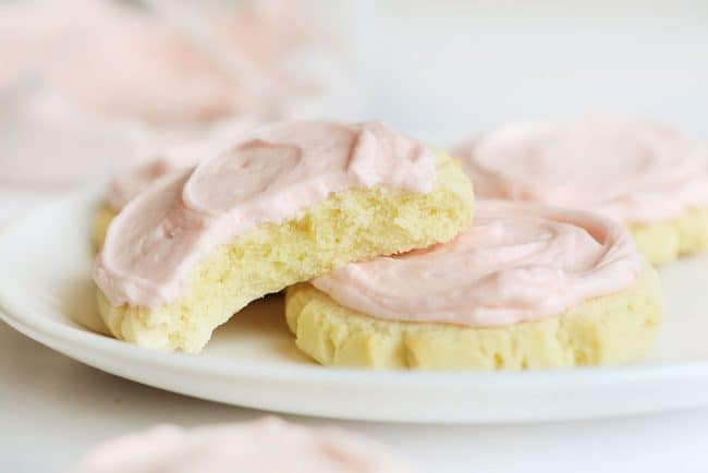 These beautiful cookies are the BEST tasting sugar cookie you will ever try!! Extensively tested and approved! #sugarcookies #sugarcookierecipe #sugarcookiefrosting #swigcookie #pinkfrosting #iambaker Perfect Sugar Cookies