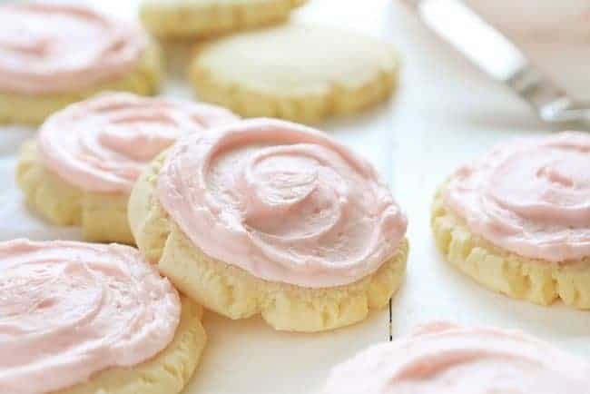 These beautiful cookies are the BEST tasting sugar cookie you will ever try!! Extensively tested and approved! #sugarcookies #sugarcookierecipe #sugarcookiefrosting #swigcookie #pinkfrosting #iambaker Sugar Cookie Recipe