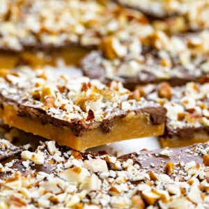 Close up of a broken piece of toffee. Candy, Candy Making, Toffee, English Toffee, How to Make Toffee, The Best Toffee, Cookie Exchange, Christmas Dessert, Dessert, Thanksgiving Dessert, Gift Exchange Dessert, i am baker, iambaker