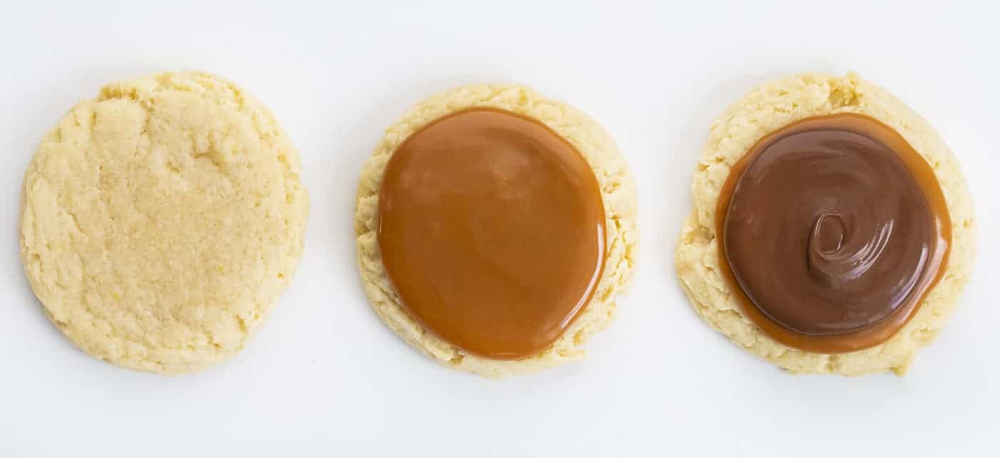 Twix Cookies are large, soft butter cookies topped with caramel sauce and melted milk chocolate. These cookies are like eating a Twix candy bar... but in cookie form! The super-soft cookies are topped with "homemade" caramel and milk chocolate, just like the famous candy bar. Baking, Cookies, Cookie Recipes, Dessert, Caramel Cookies, Caramel Recipe, Milk Chocolate, Kid Approved Snacks, i am baker, iambaker How to Make a Twix Cookie with the Layer of Chocolate and Caramel