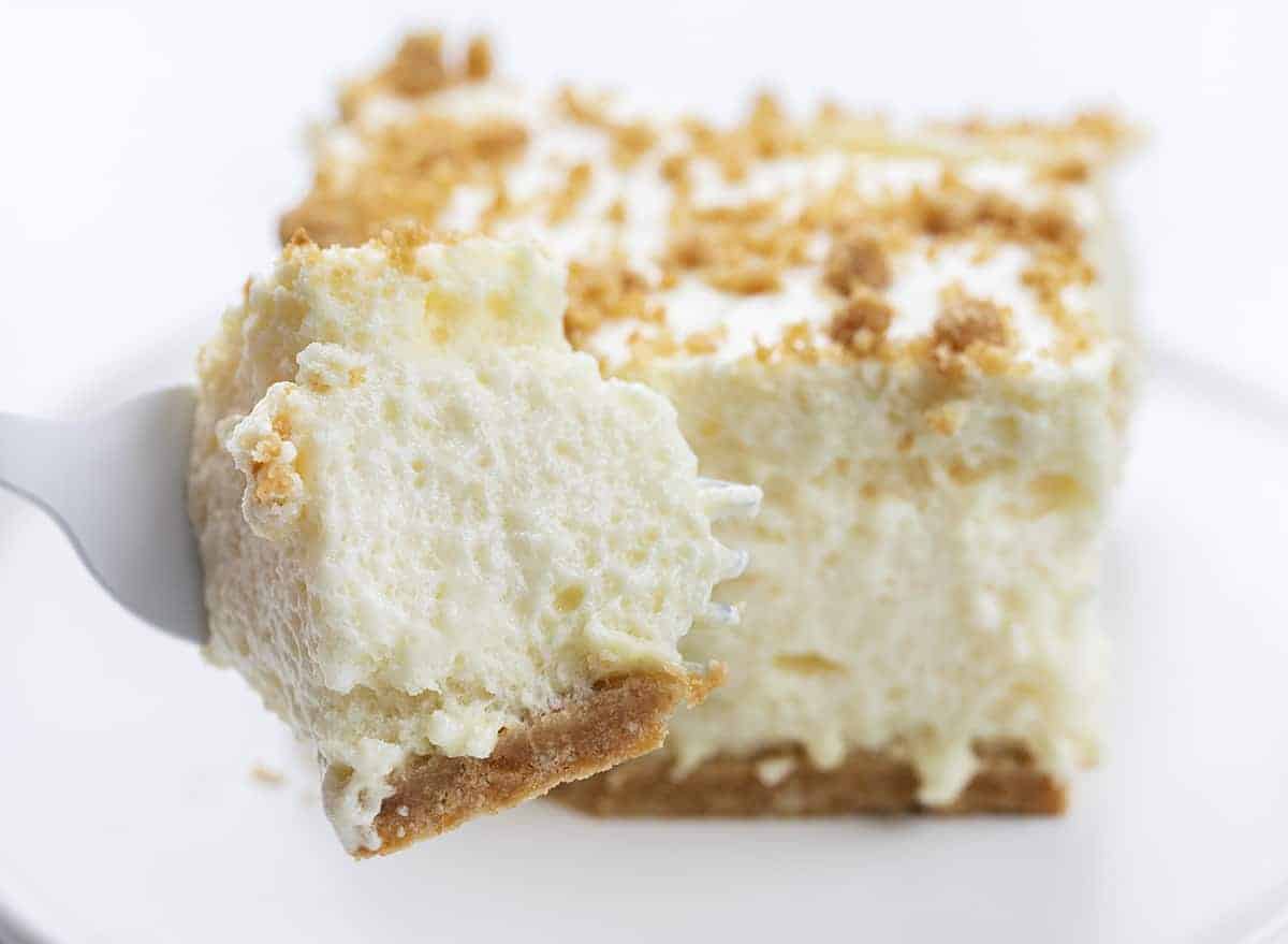 Fork Holding Bite of Woolworth Icebox Cake Recipe